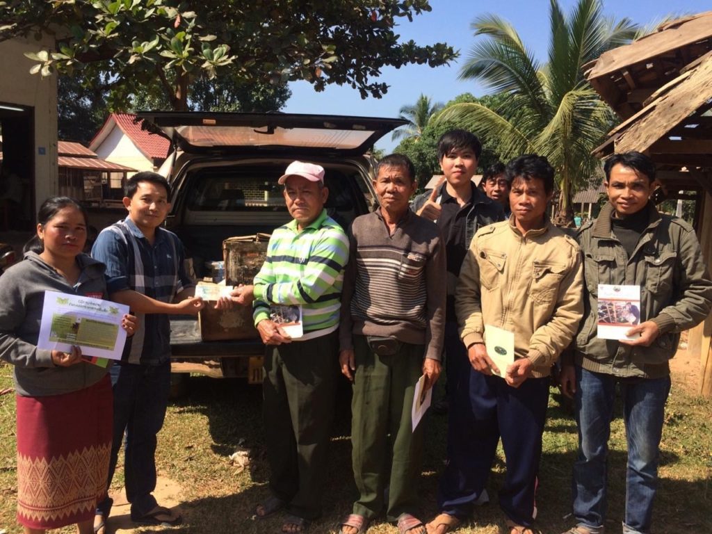 Sale of first molasses blocks to farmers in Luang Prabang province (Photo: Peter Windsor)